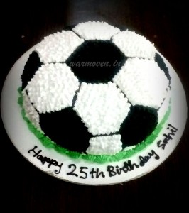 Football shaped cream cake