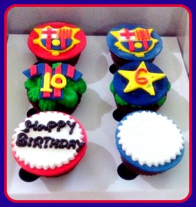 Football themed cupcakes with logo &jersey toppers