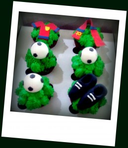 Cupcakes with football, jersey & cleats toppers