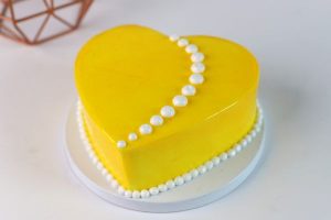Yellow heart shaped cake